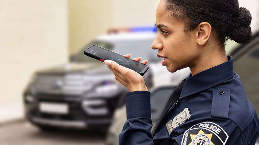 Policeman using mobile device
